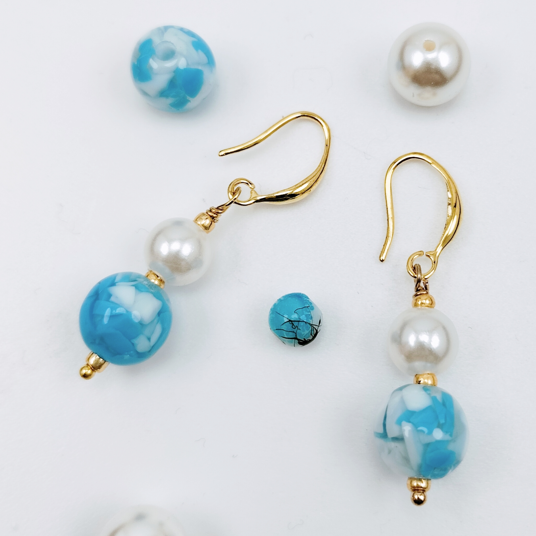 ORECCHINI CELESTE MARMORIZZATO SUNPEARL ORECCHINI CELESTE MARMORIZZATO SUNPEARL